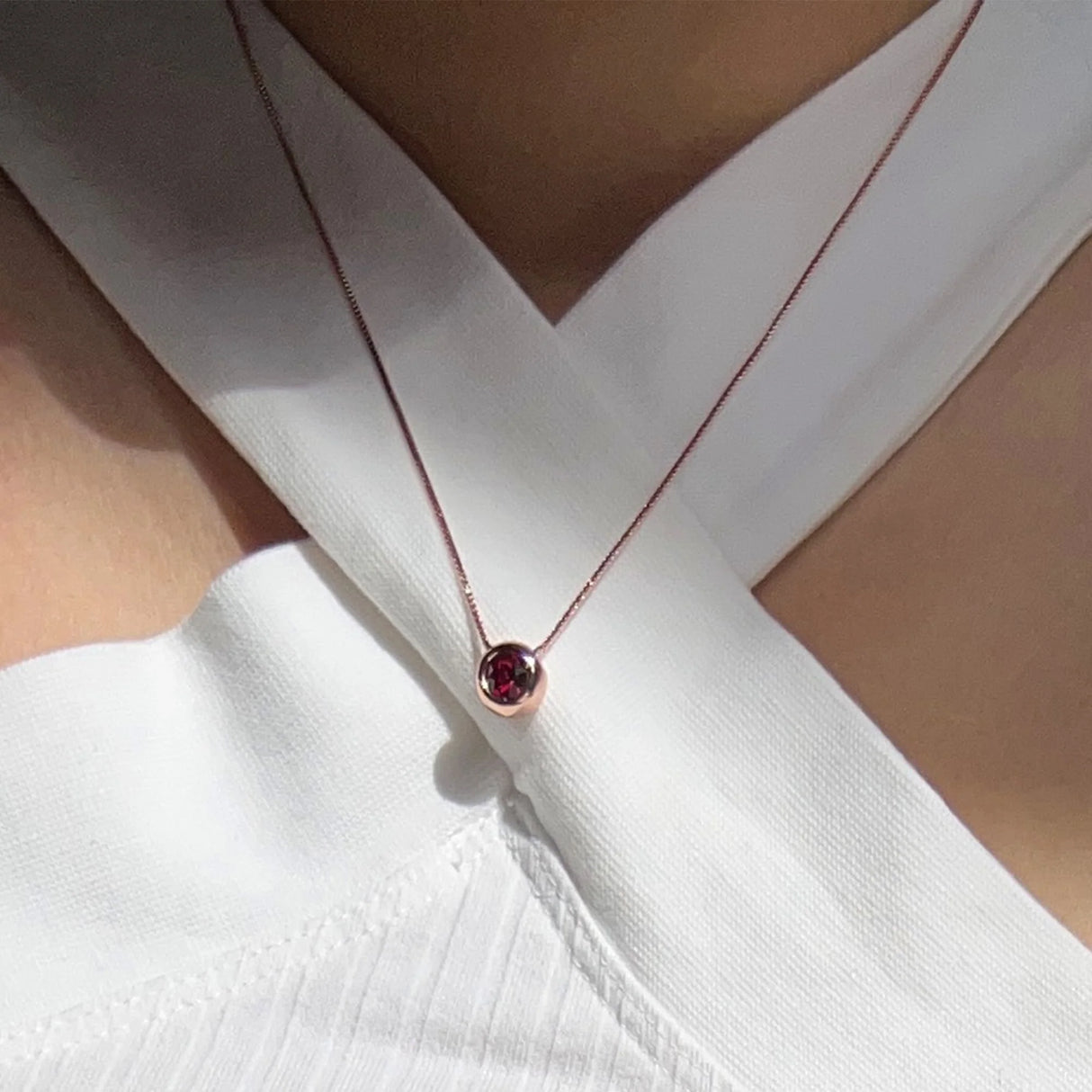 Krystal Couture Opulence Pendant Necklace Embellished with Ruby SWAROVSKI Crystals in Rose Gold