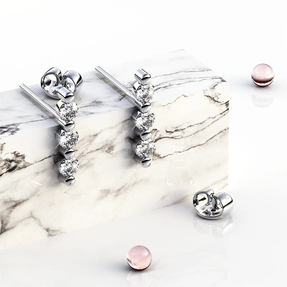 Triple Zircon Cluster Stud Earrings In White Gold
