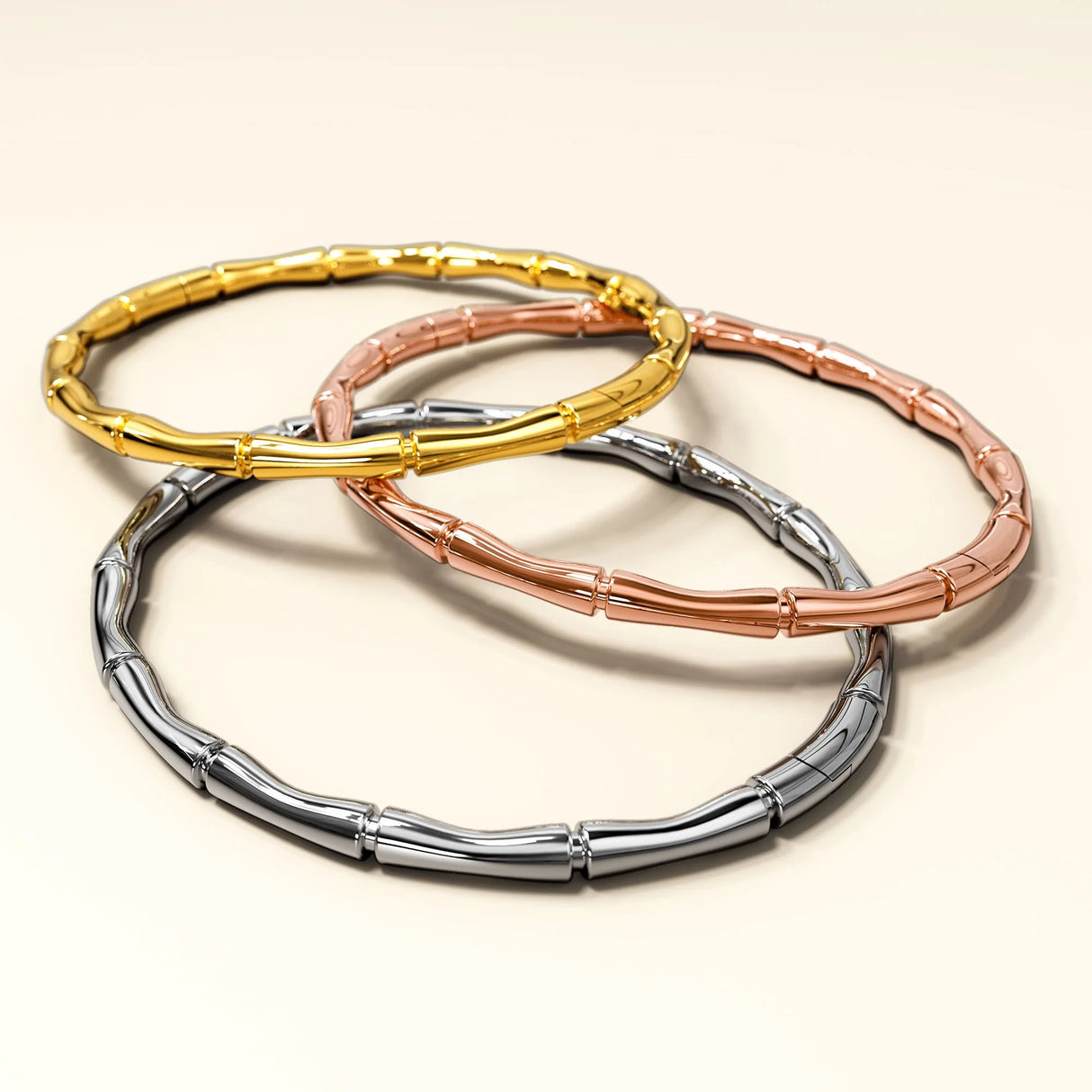 Bullion Gold Trunket Bamboo Design Stainless Steel Bangle with a High Polish Finish
