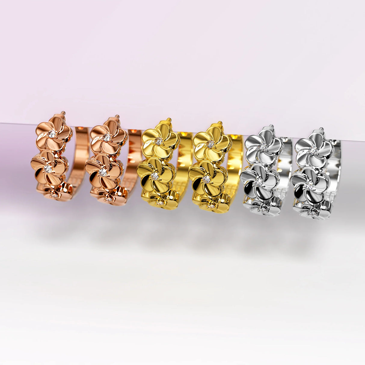 Krystal Couture Floral Trio Huggie Earrings Embellished in Swarovski Crystals in Yellow Gold