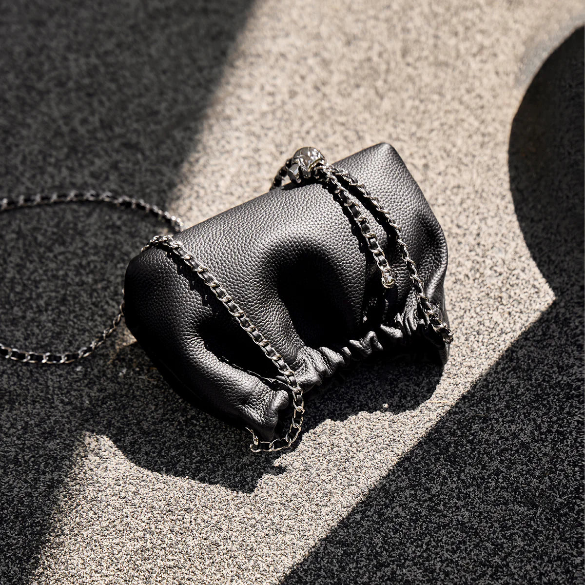 Nalandu Mini Dumpling Leather Clutch Crossbody Bag - Black