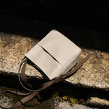 Nalandu Pebbled Leather Bucket Bag - Ivory
