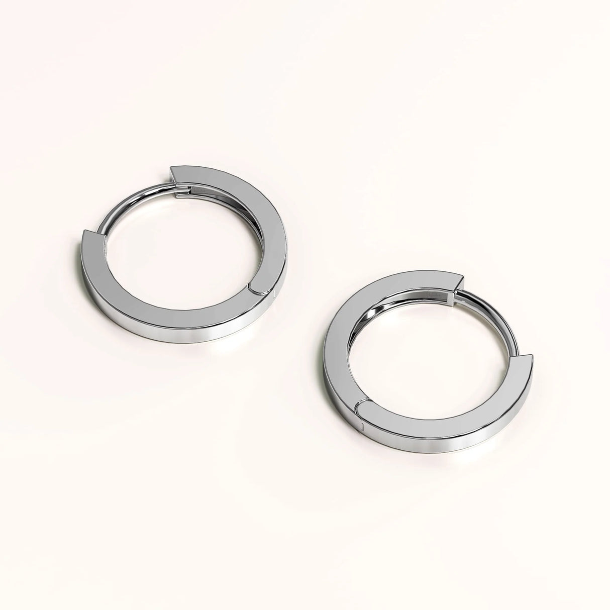 Solid 925 Sterling Silver Jerald Huggie Earrings in Silver
