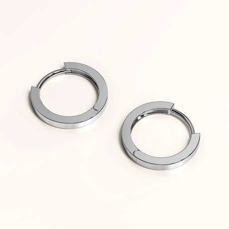 Solid 925 Sterling Silver Jerald Huggie Earrings in Silver