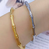 Bullion Gold Trunket Bamboo Design Stainless Steel Bangle with a High Polish Finish