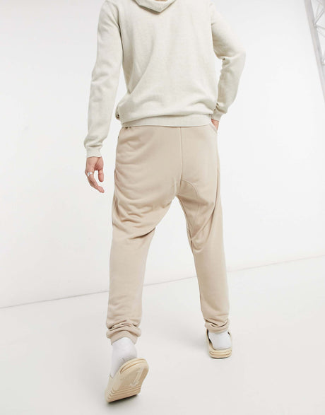 Asos Design Super Soft Viscose Drop Crotch Joggers In Beige