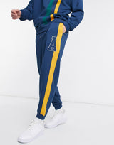 Asos Actual Co-Ord Oversized Joggers With Cut And Sew Stripes In Navy
