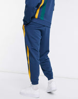 Asos Actual Co-Ord Oversized Joggers With Cut And Sew Stripes In Navy