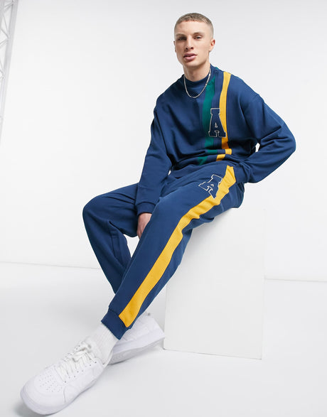 Asos Actual Co-Ord Oversized Joggers With Cut And Sew Stripes In Navy