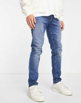 Asos Design Skinny Jeans In Mid Wash Blue