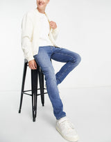 Asos Design Skinny Jeans In Mid Wash Blue