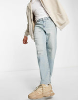 Asos Design Baggy Jeans In Tinted Light Wash Blue