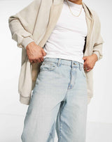 Asos Design Baggy Jeans In Tinted Light Wash Blue