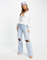 In The Style Exclusive Plunge Front Button Detail Top With Peplum Hem Detail In Ivory