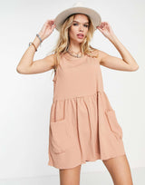 Asos Design Smock Sleeveless Textured Playsuit With Pockets In Blush