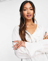 Asos Design Dobby Tie Front Top With Cut Out In Ivory