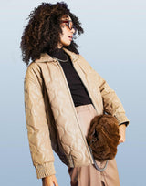 Asos Design Faux Leather Quilted Bomber Jacket In Camel