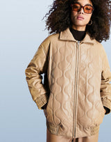 Asos Design Faux Leather Quilted Bomber Jacket In Camel