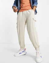 Asos Design Oversized Tapered Trousers With Cargo Pockets In Beige Texture