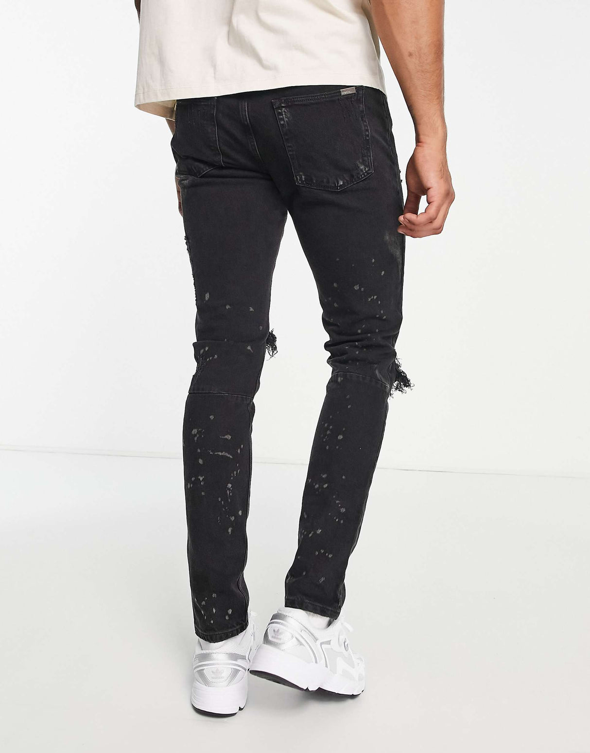 River Island Relaxed Skinny Jeans With Rips In Black