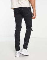 River Island Relaxed Skinny Jeans With Rips In Black