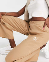 Puma Ribbed High Waisted Wide Leg Trousers In Tan -