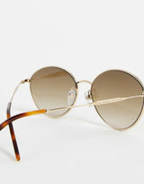 Marc Jacobs Oval Sunglasses In Gold Brown