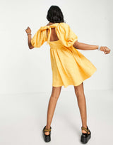 Free People Violet Textured Smock Dress In Bright Marigold