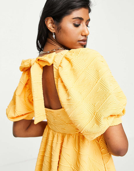 Free People Violet Textured Smock Dress In Bright Marigold