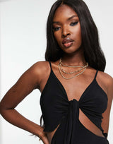 Trendyol Flare Leg Jumpsuit With Cut Outs In Black