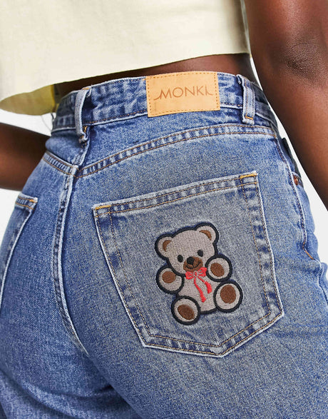 Monki Straight Leg Jeans With Teddy Embroidered Pocket In Washed Blue