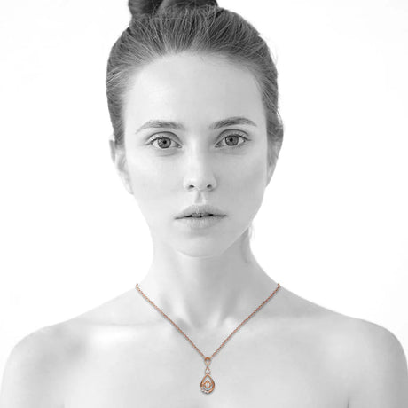 Krystal Couture Periwinkle Teardrop Necklace Embellished with Crystals from Swarovski in Rose Gold