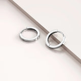 Solid 925 Sterling Silver Jerald Huggie Earrings in Silver