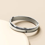 Bullion Gold Solid Oval Stainless Steel Bangle with a High Polish Finish 8mm