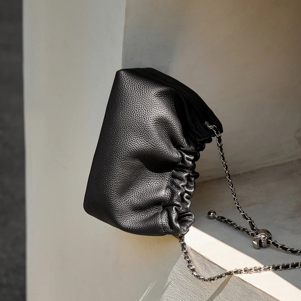 Nalandu Mini Dumpling Leather Clutch Crossbody Bag - Black