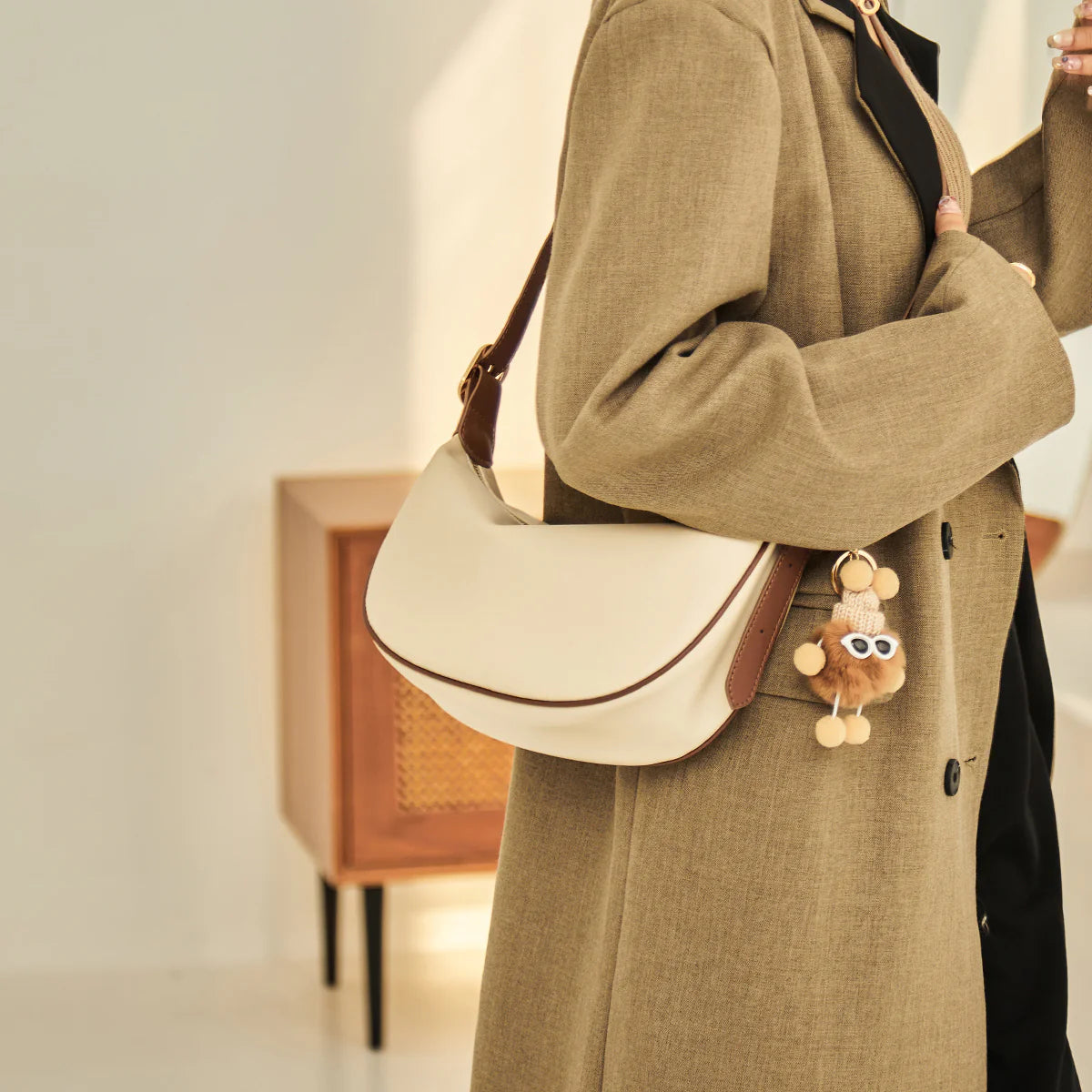 Nalandu Crescent Leather Crossbody Shoulder Bag with Bear Charm - Ivory