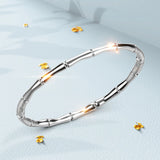 Bullion Gold Trunket Bamboo Design Stainless Steel Bangle with a High Polish Finish