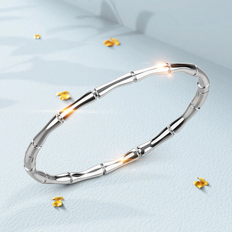 Bullion Gold Trunket Bamboo Design Stainless Steel Bangle with a High Polish Finish