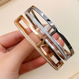 Bullion Gold Lucky Dimension Cuff Stainless Steel Bangle with a High Polish Finish