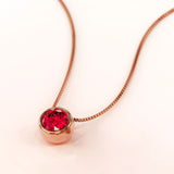Krystal Couture Opulence Pendant Necklace Embellished with Ruby SWAROVSKI Crystals in Rose Gold