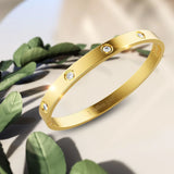 Boxed Royal Tassels & Gold Stainless Steel Bangle Set