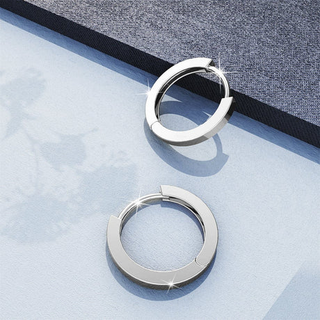 Solid 925 Sterling Silver Jerald Huggie Earrings in Silver
