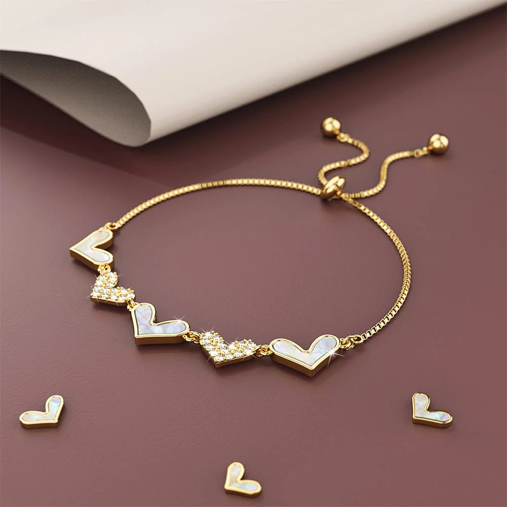 Bullion Gold Laurel Diamonelle Hearts on Mother of Pearl Shell Adjustable Slider Bracelet Gold