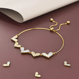 Bullion Gold Laurel Diamonelle Hearts on Mother of Pearl Shell Adjustable Slider Bracelet Gold