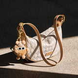 Nalandu Luna Pompom Quilted Crescent Shoulder Bag - White