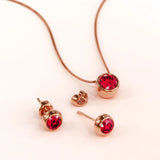 Krystal Couture Opulence Pendant Necklace Embellished with Ruby SWAROVSKI Crystals in Rose Gold