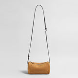 Suede Cylinder Shoulder Bag – Adjustable Crossbody Bag with Pony Charm