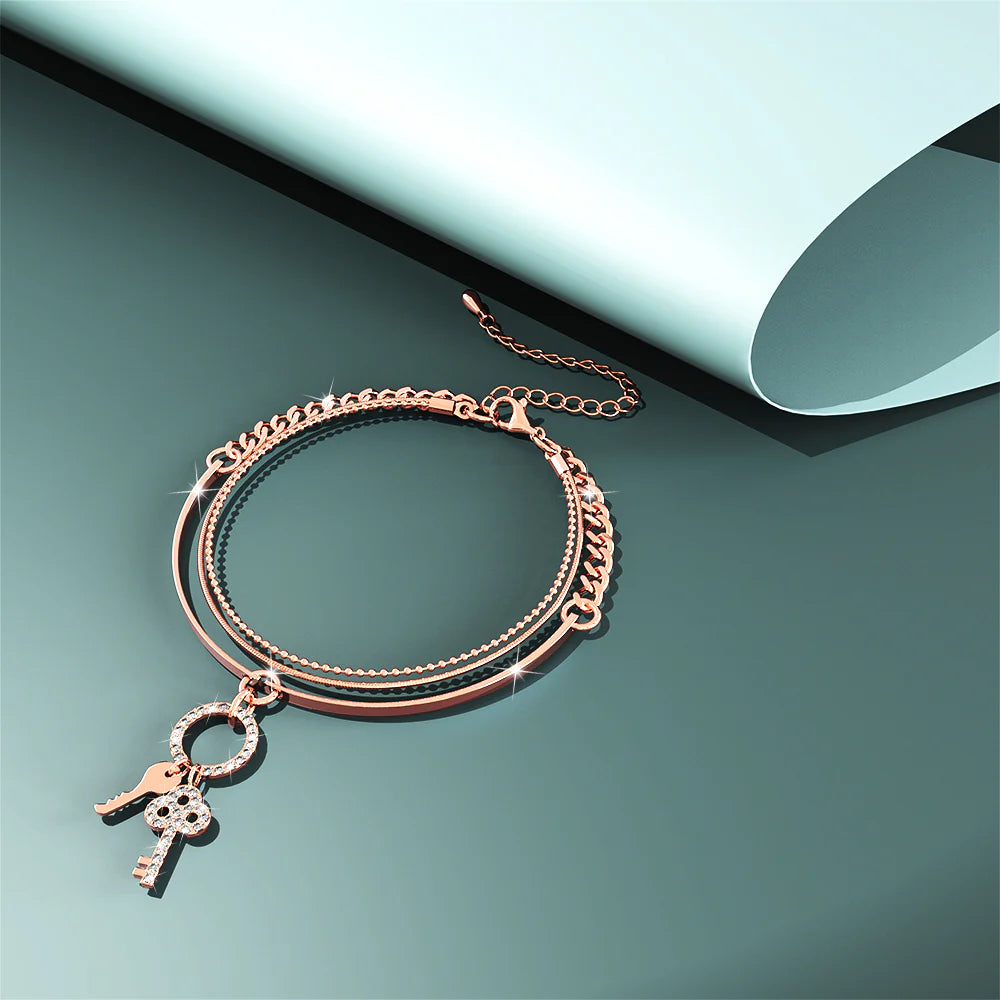 Bullion Gold Pixie Key Rose Gold Layered Stainless Steel Bracelet