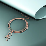 Bullion Gold Pixie Key Rose Gold Layered Stainless Steel Bracelet