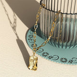 Bullion Gold Abstract Face Necklace in Gold